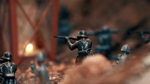 Toy soldiers simulating a world war ii battle in a miniature diorama