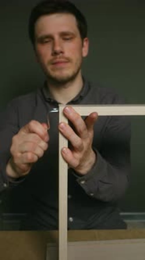 Soporte de esquina Carpenter que asegura un marco de madera