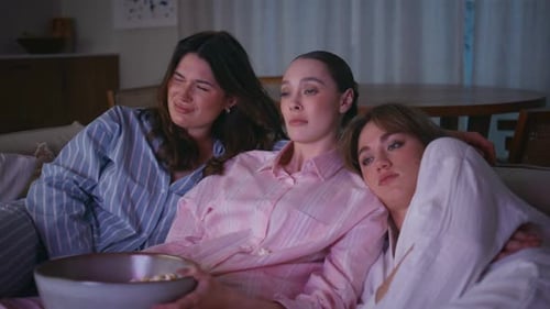Pajamas Women Sleeping on Home Couch at Friendly Sleepover Closeup Sleepy Girls