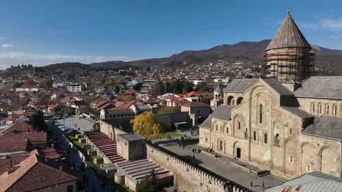 Aerial view of Orthodox Svetitskhoveli Cathedral in Mtskheta city, Georgia 2022 autumn