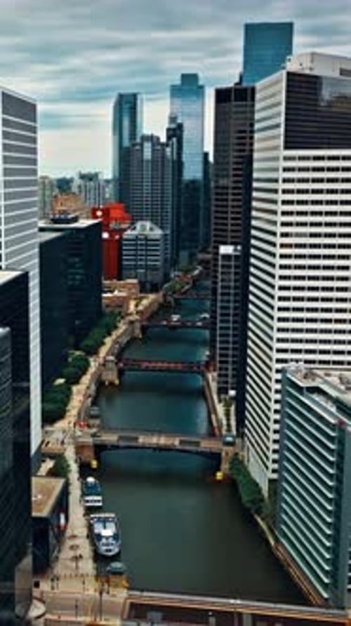 Aerial view of downtown Chicago showcasing the river and skyscrapers