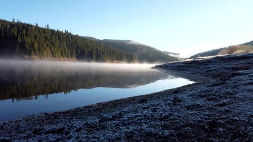 Time Lapse of Morning Mist, Fog Rolling Across Lake