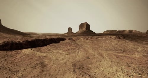 Explore the Vast Desert Landscape with Stunning Rock Formations Under the Sun