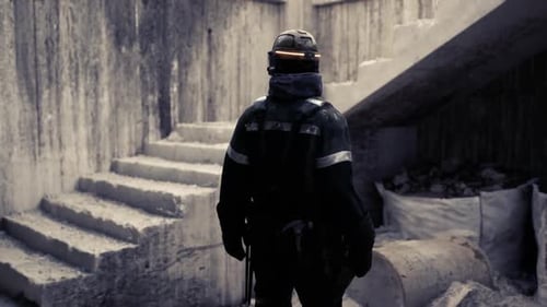 Worker Surveying Abandoned Construction Site with Debris and Stairs