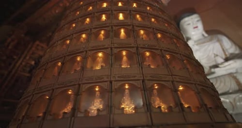 Small Luminous Buddhas In The Temple