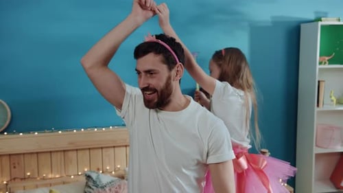 Father and Daughter Dancing and Having Fun