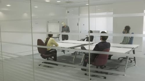 Business Presentation in a Modern Glass Office
