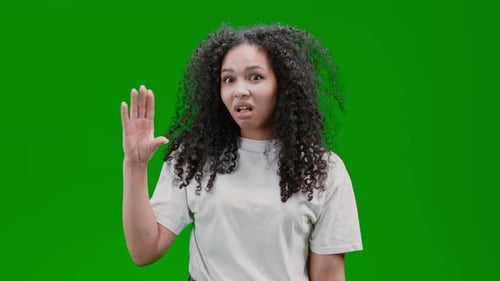 Young Woman Gesturing Small Size on Green Screen