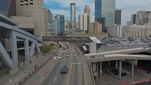 Aerial view of traffic on road in Atlanta City with Skyscraper buildings in background