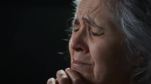 Profile of Senior Woman in Tears