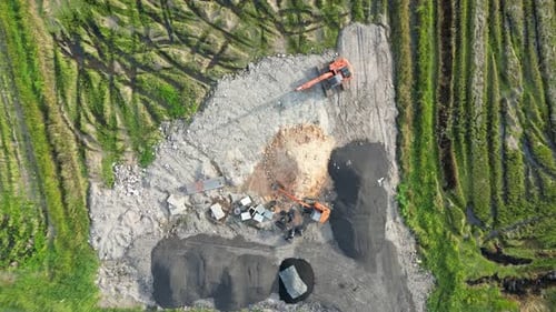 Excavators at Work on Rural Construction Site