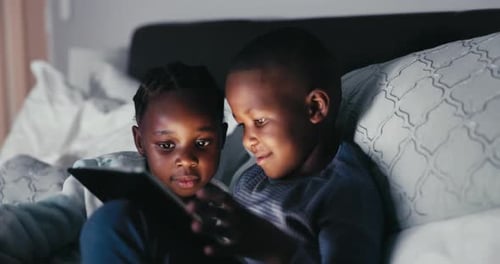 Black kids, happy and tablet in home bedroom, bonding and smile together