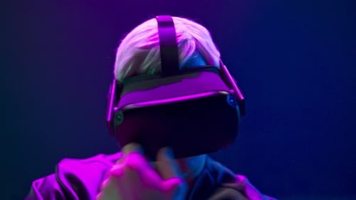 Vr Glasses Person Dancing Metaverse Closeup. Esport Blonde Gamer Using New Technology Goggles Pla...