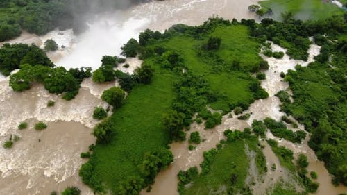 Wide Aerial Dolly over Ban Gioc Waterfall revealing pool below, Thác Bản Giốc, Detian Falls, North V