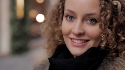 Young Woman Smiling in Urban Fashion Close-Up