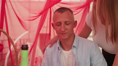 Loving Couple Embracing at Wedding Celebration