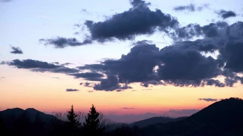 Majestic Mountain Sunset with Colorful Sky and Clouds