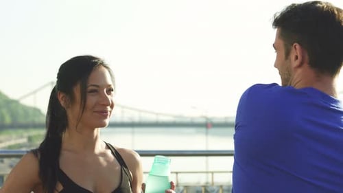 Young Adults Exercising in the City on Sunny Day