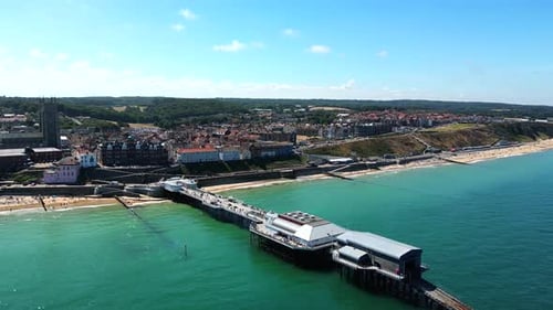 Aerial view of Cromer pier and lifeboat station, looking towards Cromer town sea front, Cromer, Norf