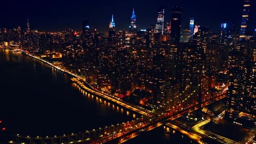 Amazingly lit streets, roads, bridges and buildings of New York, the USA.