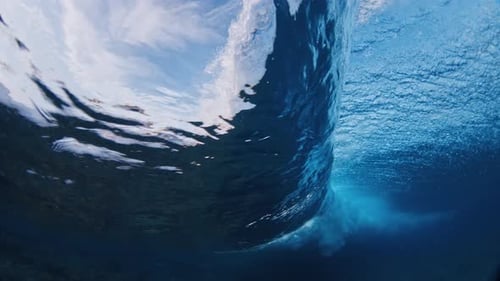 Underwater View of the Ocean Wave Breaking Over the Shore in the Maldives