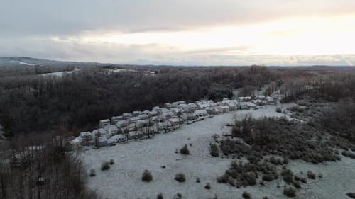 Aerial Approach Over Snow-Covered Rooftops in Morgantown, West Virginia