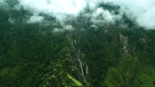 Aerial View of Misty Himalayan Waterfall – Yulla Trek, Himachal