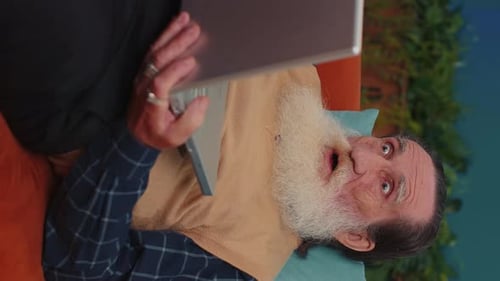 Overjoyed Senior Man Working on Laptop Celebrate Success Win Money in Lottery Get Online Good News