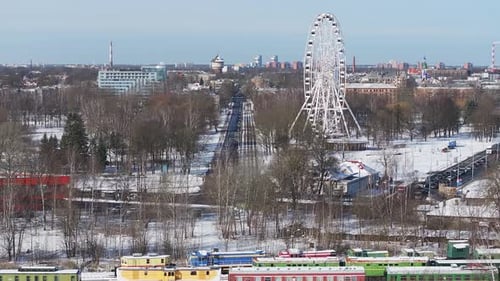 Aerial View of Riga in Winter with Ferris Wheel and Skyscraper