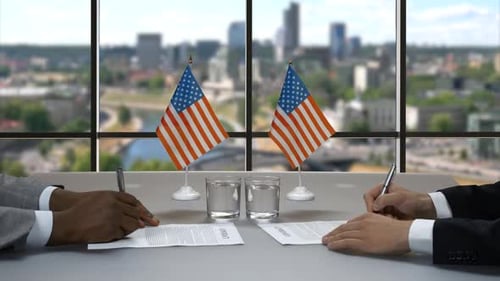 Business Handshake after Signing Contract