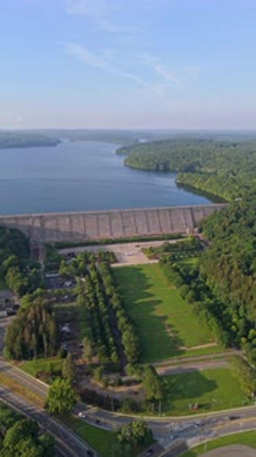 Kensico Dam Plaza at sunset, New York, USA. Aerial drone panoramic view, vertical format