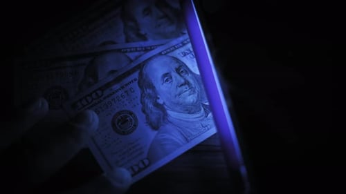Examining US Currency with Ultraviolet Light