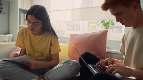 Young Adults Studying Together at Home