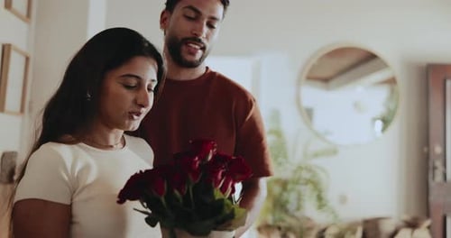 Romantic Couple with Roses at Home
