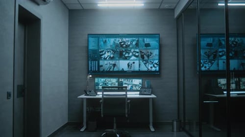 Security Office With Video Surveillance Wall Display