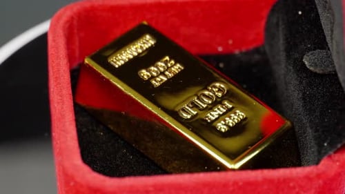 Rotating Jewelry Box Revealing 200 Gram Gold Bar