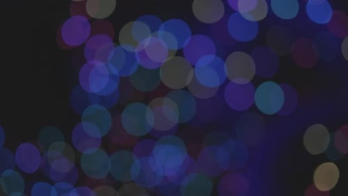 View Of Blurry Natural Lights In Dark Background