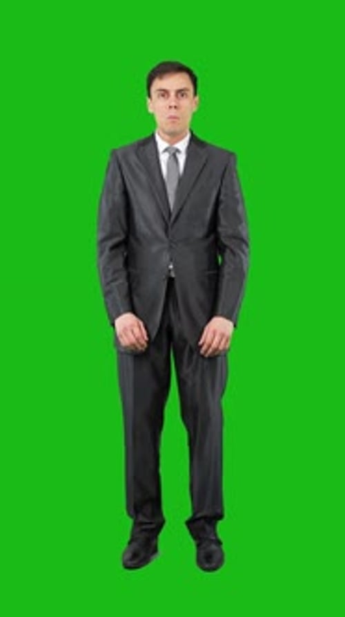 Surprised Male Employee Looking at Camera in Chroma Key