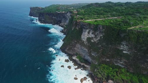 Uluwatu Coastline with Cliffs and Waves in Bali Scenic Aerial View Landscape in Bukit