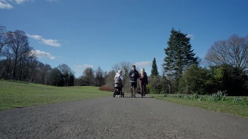 Loving parental baby care, exercise stroll, slow motion leisure walk