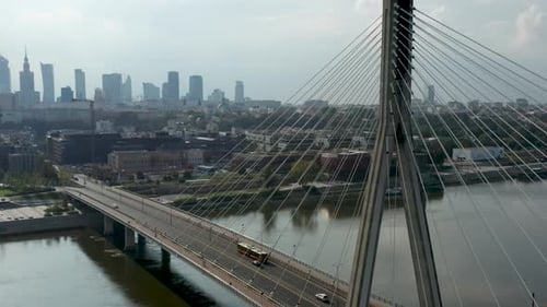 Aerial drone view of Świętokrzyski Bridge and Warsaw city center in the background. Warsaw, Poland.