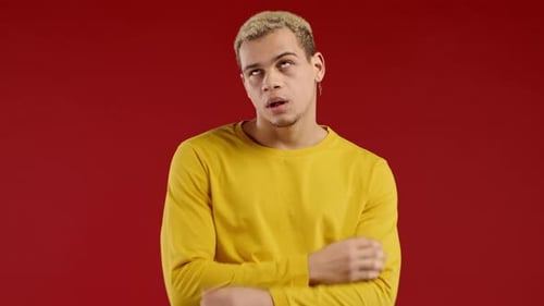 Man Rolling Eyes in Disgust and Exasperation