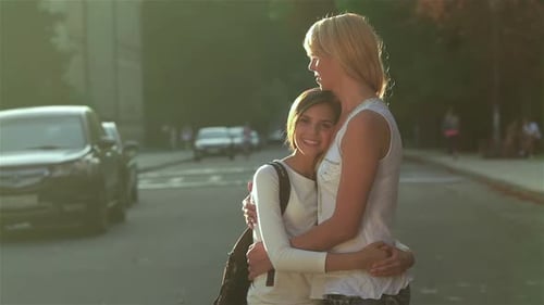 Standing in an Embrace on the Road