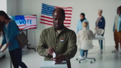 Voters Casting Ballots at Polling Station