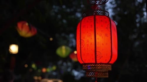 Vibrant Red Lanterns Illuminating the Festive and Colorful Streets of the City Tonight