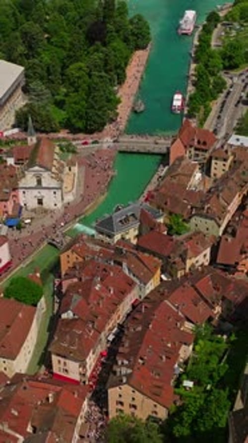 Old Town Center of Annecy and the River Thiou with Tourists Visiting Aerial View of City Building
