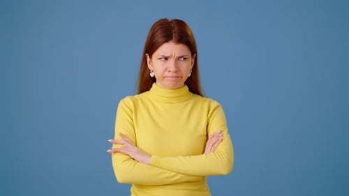 Frustrated Woman Expressing Disagreement in Studio Shot