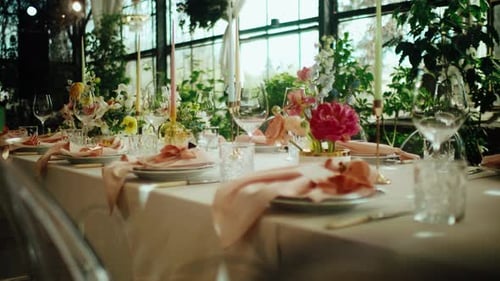 Elegant Wedding Table Setting with Floral Arrangements