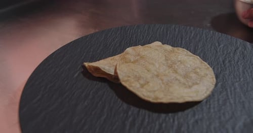 Shredded Meat Being Added to Tortillas