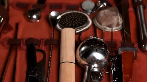 the bartender prepares a cocktail at the bar